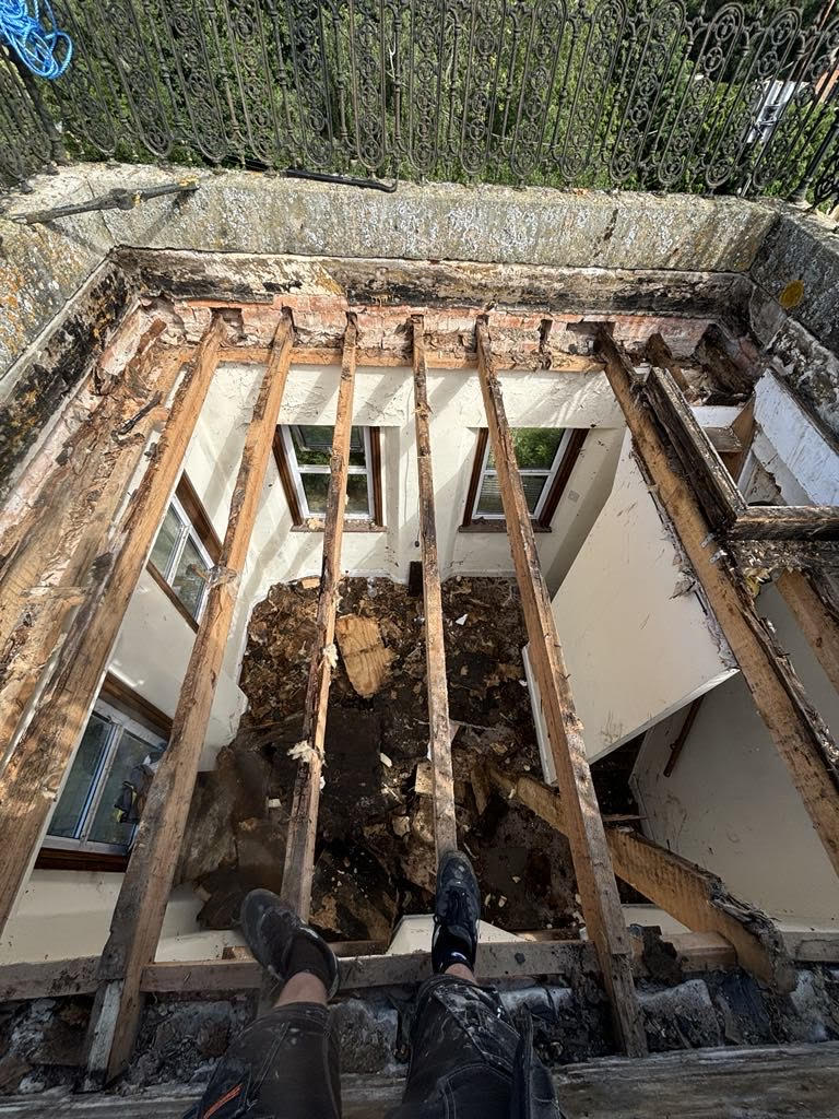 Rotten roof joists discovered at Beckford Grange, Warwickshire — before structural repair by O.F Carpentry and Building