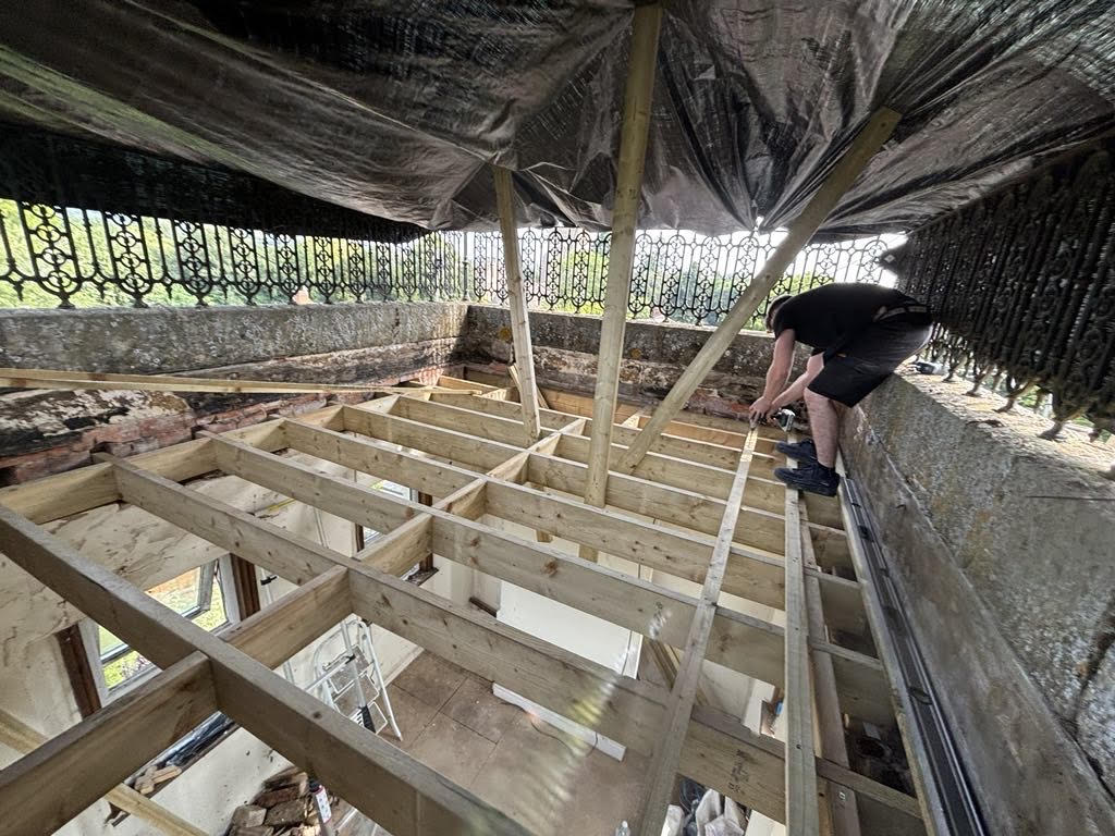 New graded timber joists installed to replace rotten structure at Beckford Grange