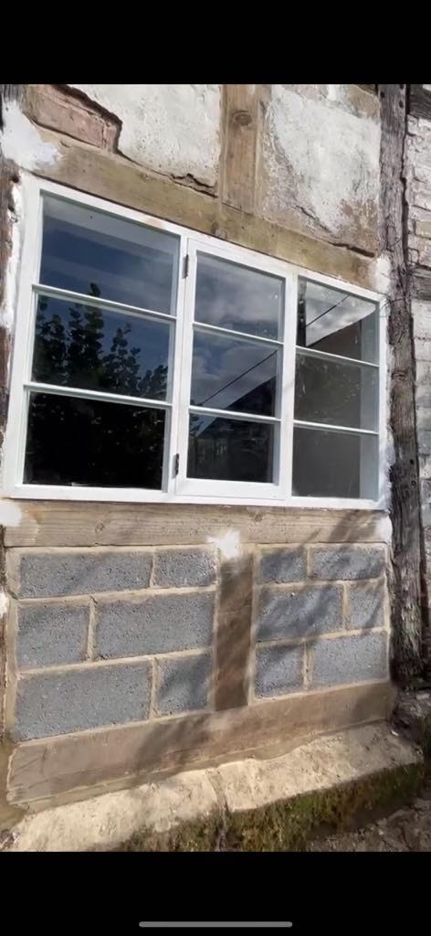 Completed bespoke hand-crafted timber window fitted to the restored period property